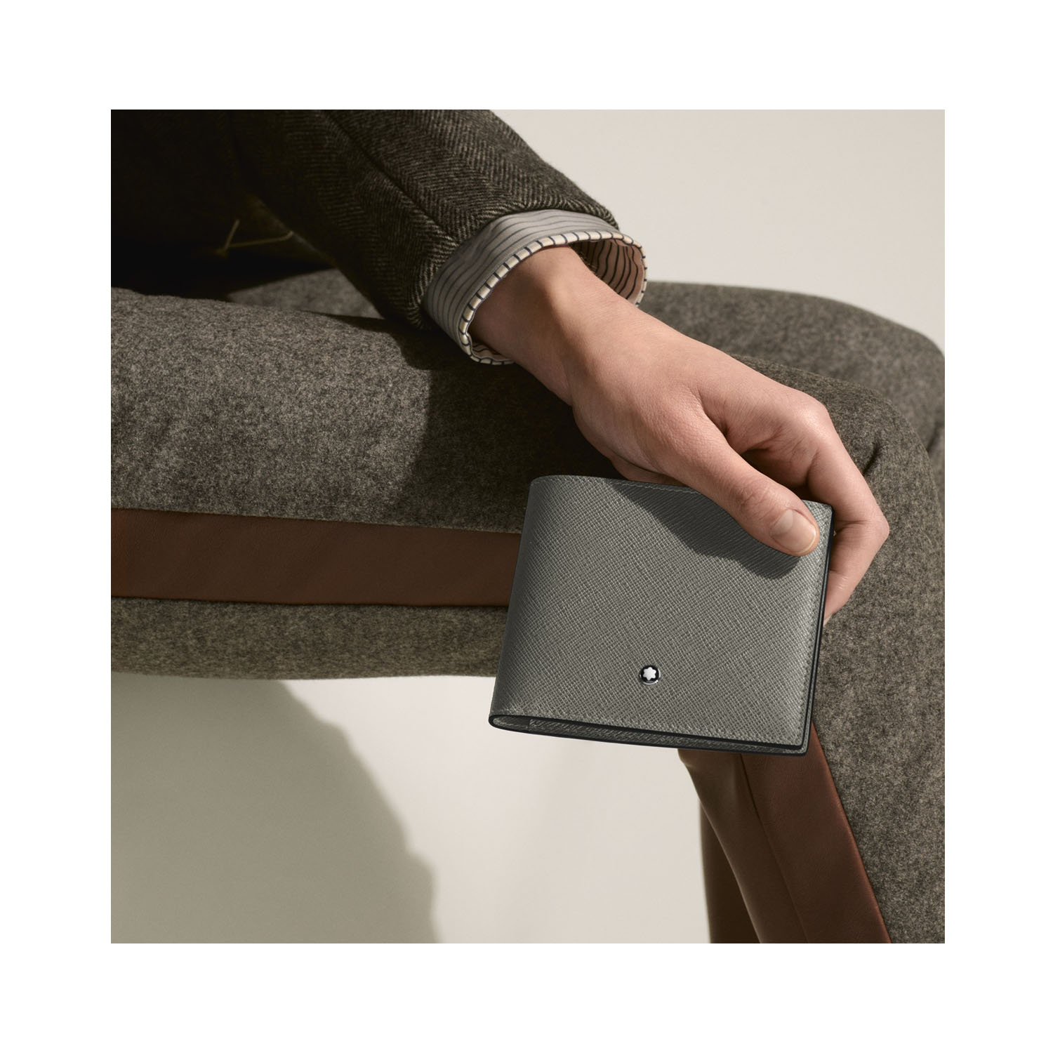 A Montblanc, Sartorial wallet crafted in medium grey Saffiano-printed leather wallet with eight credit card slots, two banknote compartments and two additional pockets.