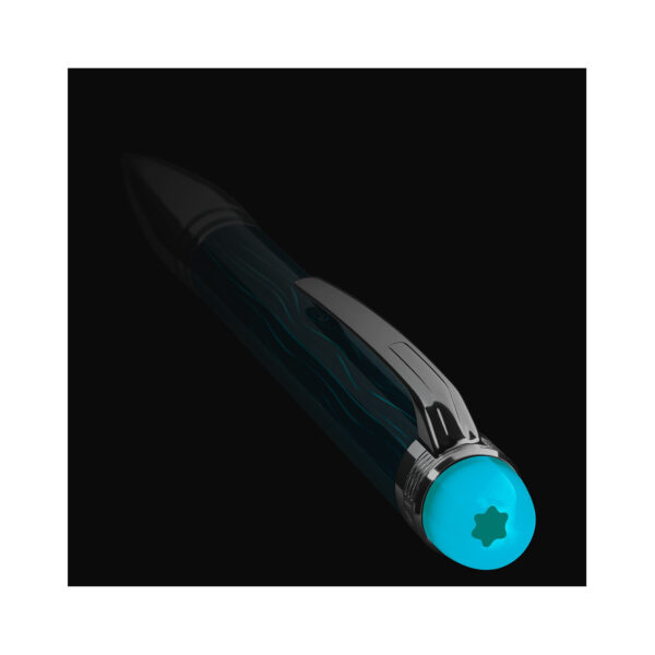 A Montblanc, Starwalker PolarGreen Metal Ballpoint pen crafted in green precious resin with platinum-coated fittings and a dome made from transparent resin with the Montblanc emblem that glows in low light.