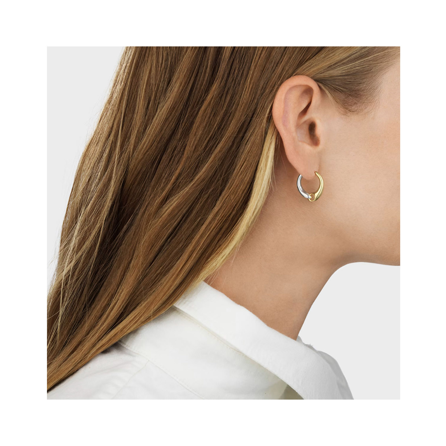 Georg Jensen, Sterling Silver & 18ct Yellow Gold Reflect Large Hoop Earrings A pair of sterling silver and 18ct yellow gold large hoop earrings belonging to Georg Jensen's Reflect collection, for pierced ears.