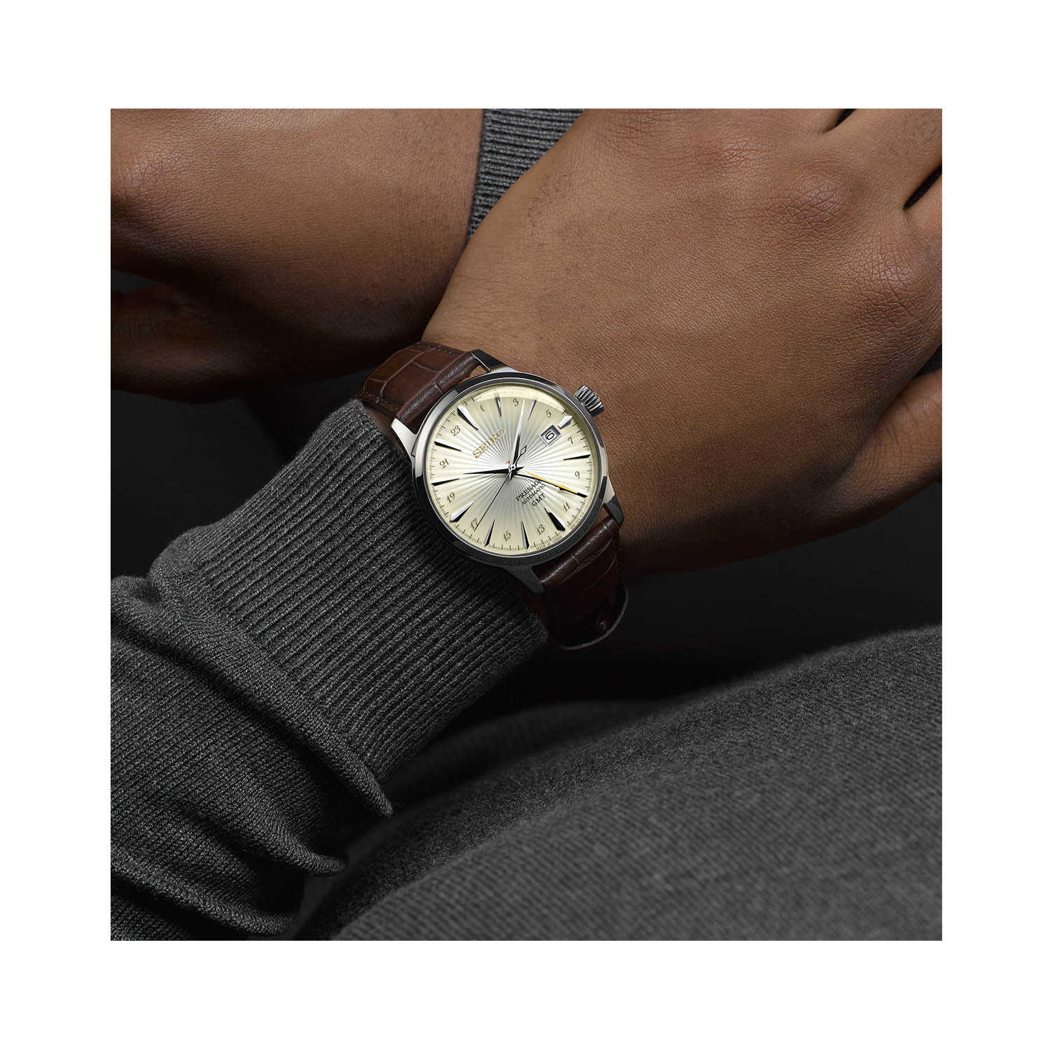 Seiko, Presage ‘Acacia’ Cocktail Time GMT with a 40.5mm stainless steel case and a brown leather strap featuring a date function and a cream coloured dial.