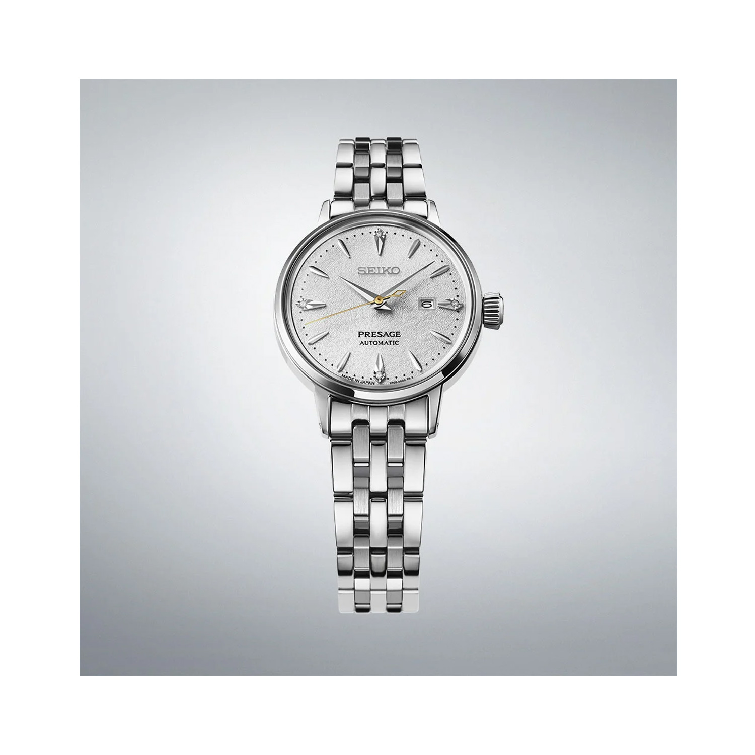 Seiko, Presage ‘Hot Buttered Rum’ Diamond Set Cocktail Time with a 30.3mm stainless steel case and bracelet strap featuring a date function and a silver diamond set dial.