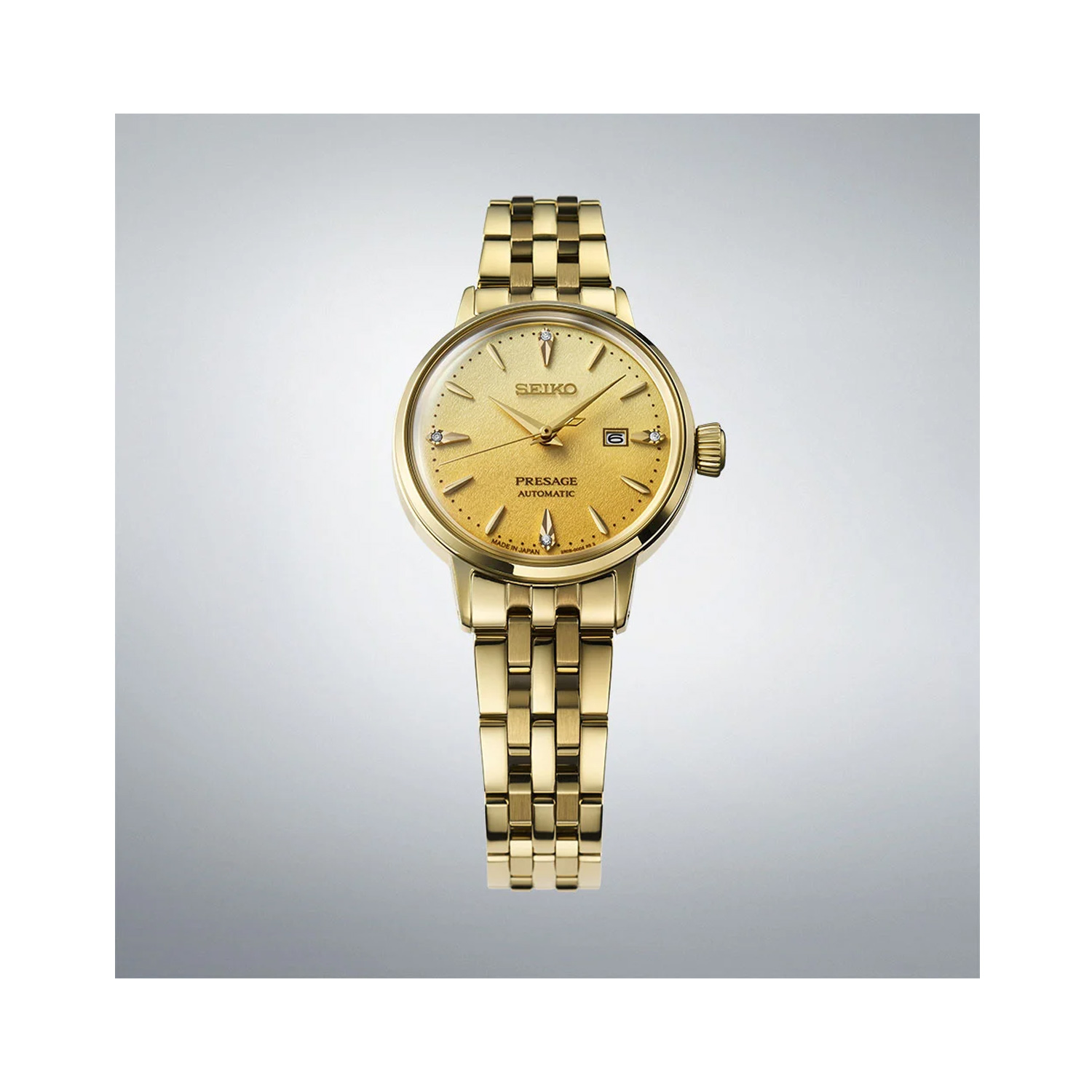 Seiko, Presage 'Eggnog' Diamond Set Cocktail Time with a 30.3mm stainless steel case and bracelet strap featuring a date function and a gold coloured diamond set dial.