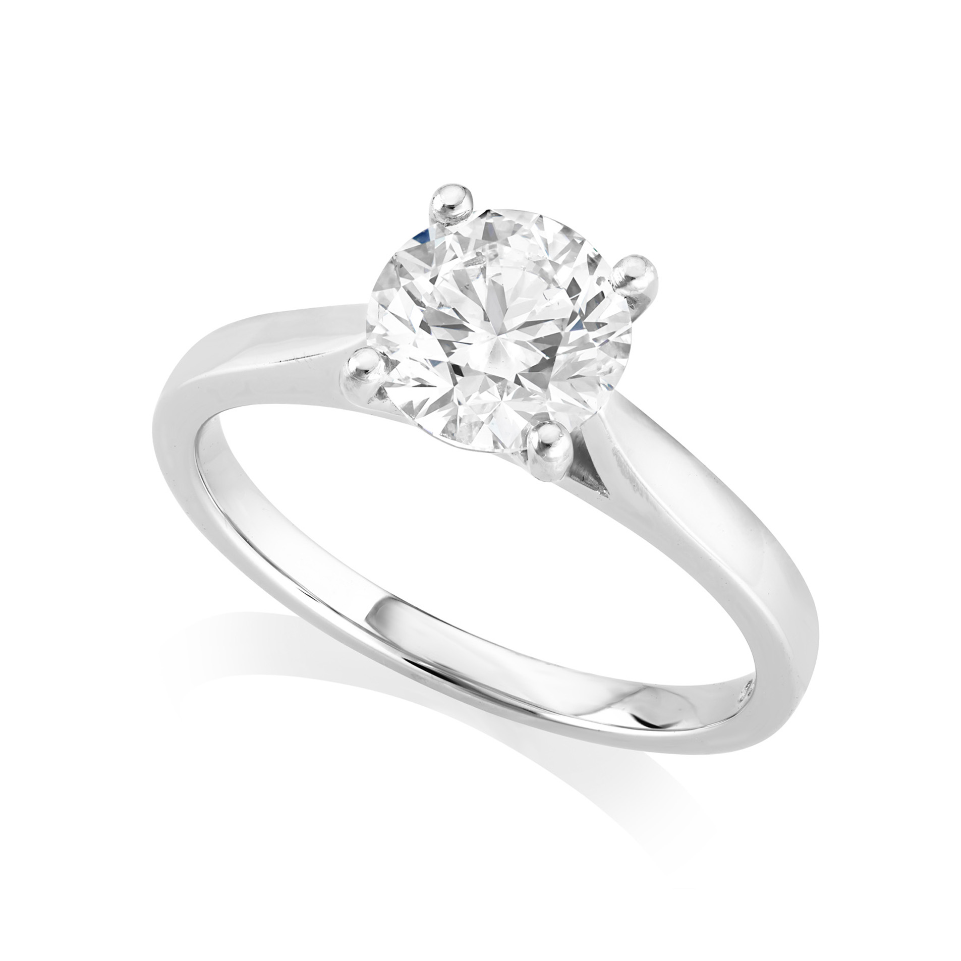A platinum round brilliant cut diamond single stone ring from H. L. Brown's Leon collection.
