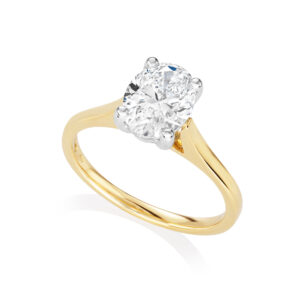 An 18ct yellow gold and platinum oval shaped diamond single stone ring belonging to H. L. Brown’s Leon Collection.