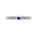 An 18ct white gold Flex'It bracelet set with a single blue sapphire belonging to FOPE's Souls collection.