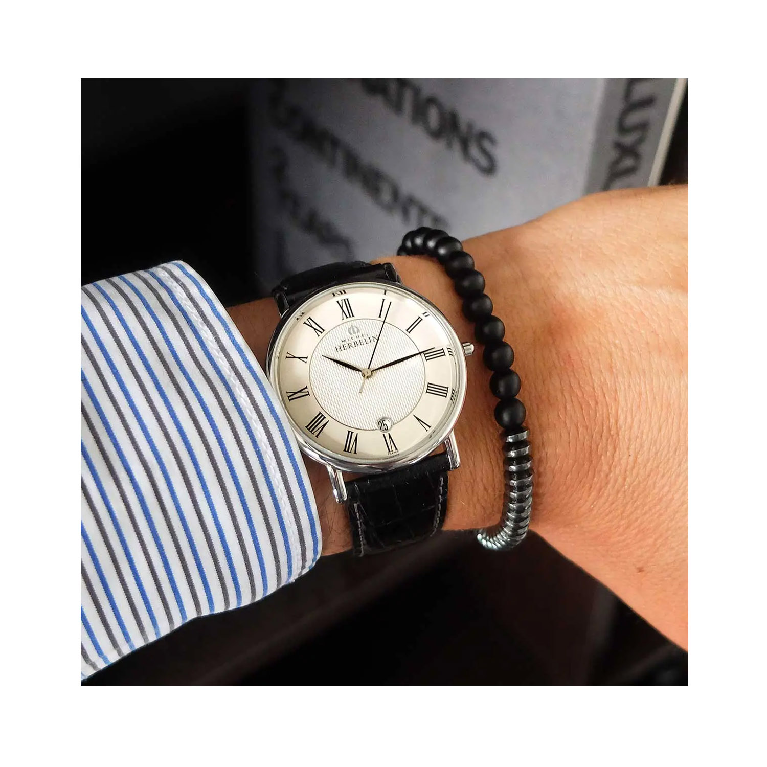 Herbelin, Classique White, Quartz Men’s 38mm Watch Herbelin, Classique with a 38mm stainless steel case and black leather strap featuring a date function and a white dial.