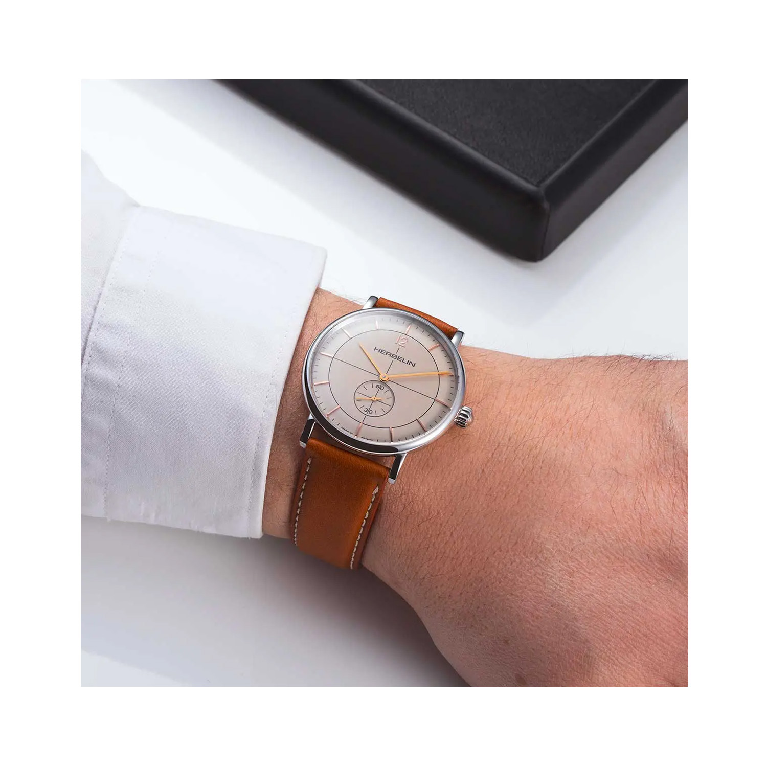 Herbelin, Inspiration with a 40mm stainless steel case and a brown leather strap featuring a small seconds hand function and an ivory coloured dial.