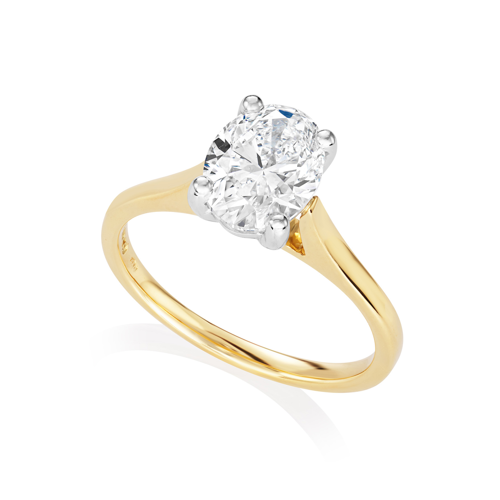 An 18ct yellow gold and platinum oval shaped diamond single stone ring belonging to H. L. Brown's Leon collection.