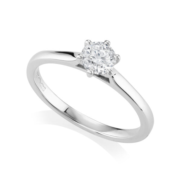 A platinum round brilliant cut, six claw set diamond single stone solitaire ring belonging to H. L. Brown's Harris Collection.