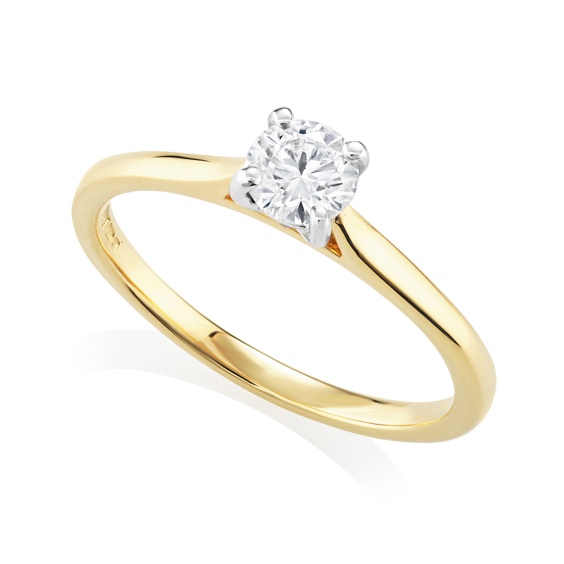 18ct Yellow Gold & Platinum Leon Collection Round Brilliant Cut Diamond Ring: 0.55 carats An 18ct yellow gold and platinum round brilliant cut, four claw set diamond solitaire ring belonging to H. L. Brown's Leon collection.