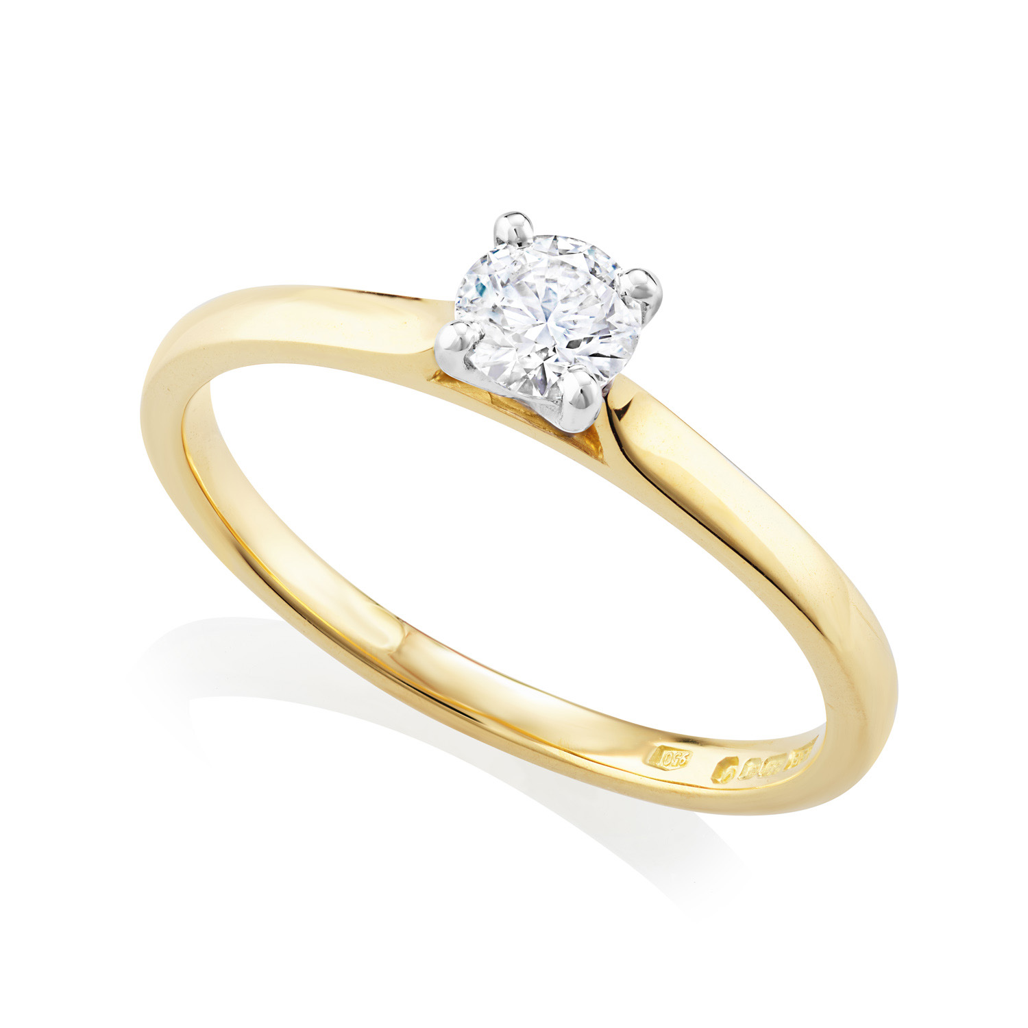 18ct Yellow Gold & Platinum Leon Collection Round Brilliant Cut Diamond Ring: 0.33 carats An 18ct yellow gold and platinum round brilliant cut, four claw set diamond single stone solitaire ring belonging to H. L. Brown's Leon collection.