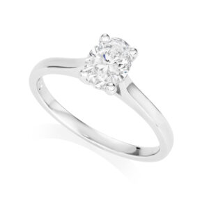 A platinum oval shaped, four claw diamond single stone solitaire ring belonging to H. L. Brown's Leon collection.