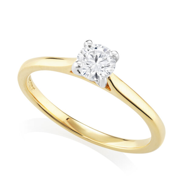 An 18ct yellow gold and platinum round brilliant cut, four claw set diamond single stone ring belonging to H. L. Brown's Leon collection.