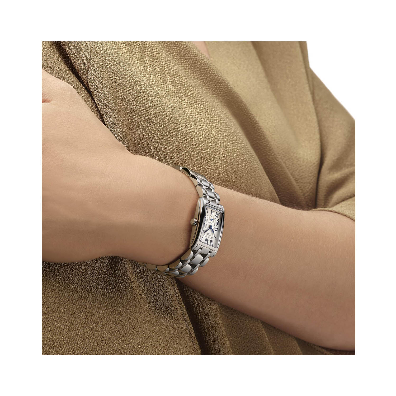 Longines, DolceVita with a 20.8 x 32mm stainless steel dial and bracelet strap featuring a small seconds hand on a silver dial.