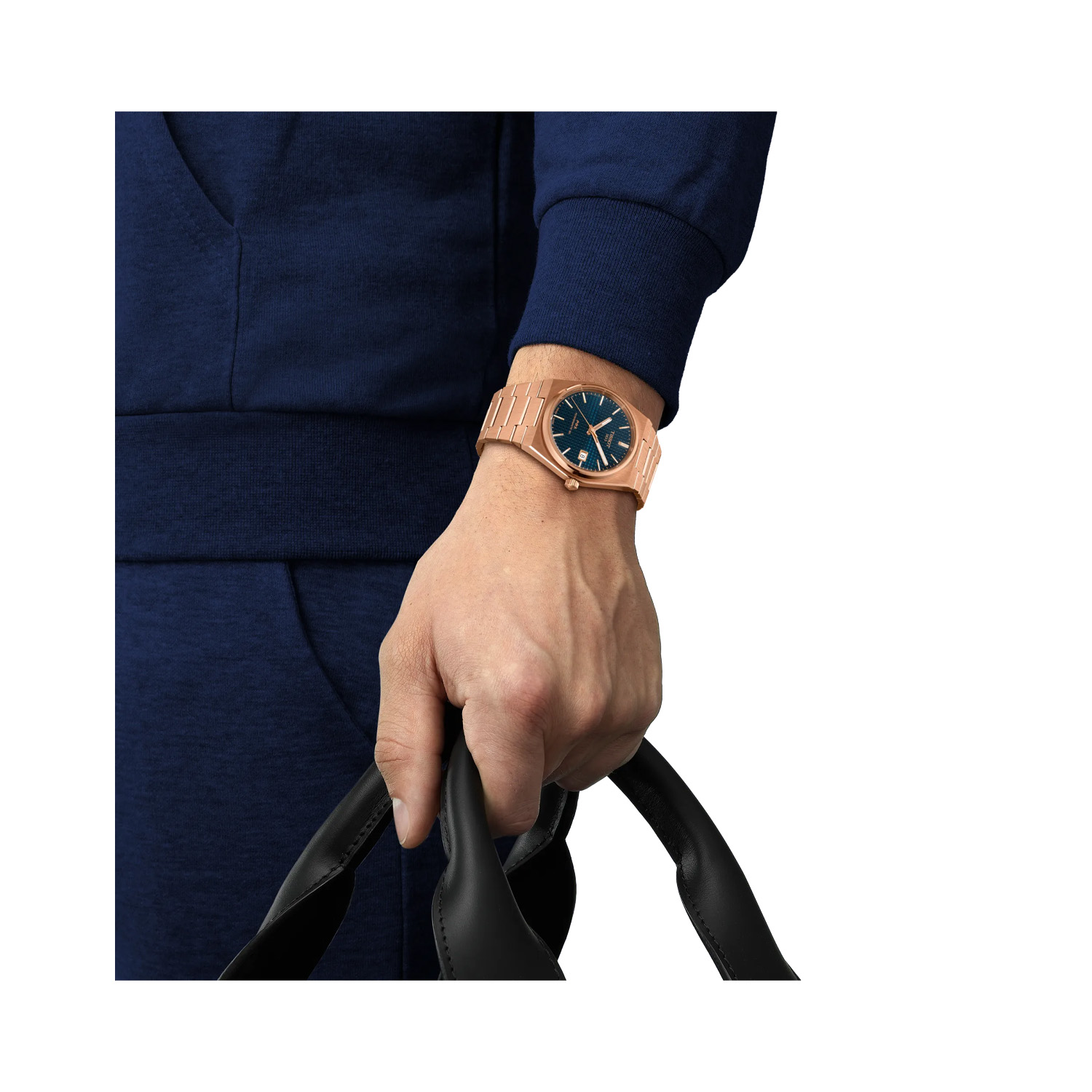 Tissot, PRX Powermatic 80 with a 40mm stainless steel and rose gold PVD coated case and bracelet strap featuring a date function and a blue dial.