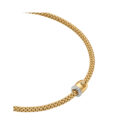 An 18ct yellow gold Flex'It necklace with one large yellow gold diamond set rondel and a smaller white gold diamond set rondel, belonging to FOPE's Solo Collection.