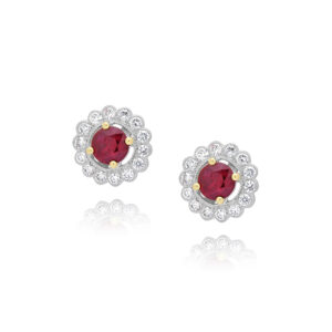 A pair of 18ct white and yellow gold ruby and diamond set stud earrings, for pierced ears.