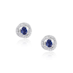 A pair of 18ct white gold round sapphire and diamond set swirl cluster stud earrings, for pierced ears.