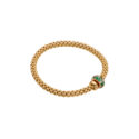 An 18ct yellow gold Flex'It bracelet with an emerald and diamond rondel and a polished diamond set rondel, belonging to FOPE's Solo collection.