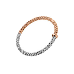 An 18ct white and rose gold Flex'It bracelet with a single rose gold diamond set rondel belonging to FOPE's Solo collection.