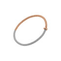 FOPE, Prima Collection, 18ct White & Rose Gold Diamond Flex'It Bracelet: 0.01 carats An 18ct white and rose gold Flex'It bracelet with a single rose gold diamond set rondel belonging to FOPE's Prima collection.