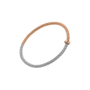 An 18ct white and rose gold Flex'It bracelet with a single rose gold diamond set rondel belonging to FOPE's Prima collection.