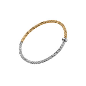 An 18ct white and yellow gold Flex'It bracelet with a single white gold diamond set rondel belonging to FOPE's Prima collection.