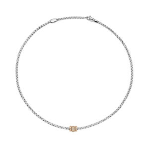 An 18ct white and rose gold Flex'It necklace with three rose gold diamond set rondels, belonging to FOPE's EKA collection.