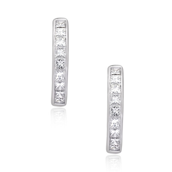 A pair of 18ct white gold princess cut diamond channel set hoop earrings, for pierced ears.