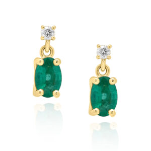 A pair of 18ct yellow gold oval emerald and brilliant cut diamond set drop earrings, for pierced ears.