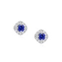 A pair of 18ct white gold round sapphire and brilliant cut diamond cluster stud earrings, for pierced ears.