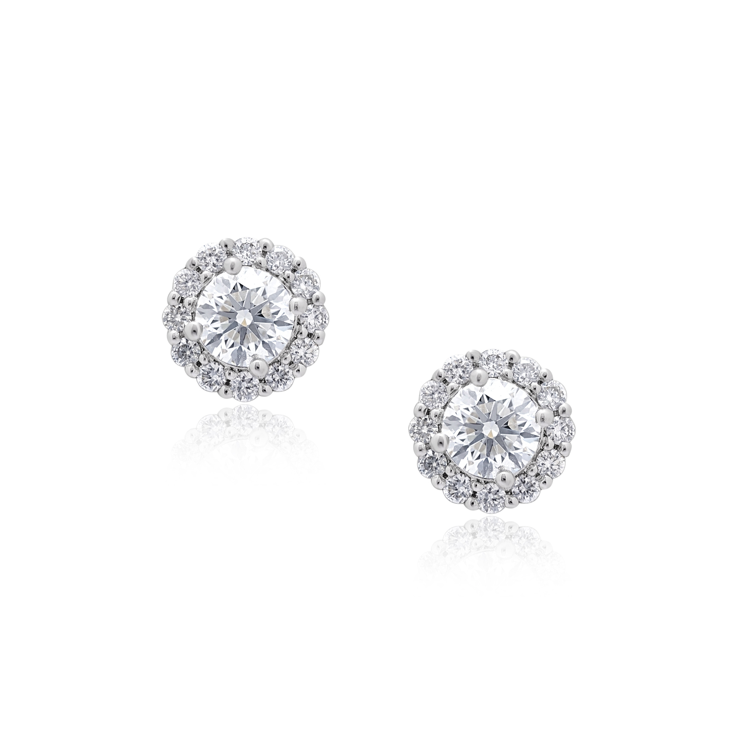 A pair of 18ct white gold diamond cluster stud earrings for pierced ears.