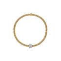 FOPE, Prima Collection, 18ct Yellow Gold Diamond Flex'It Bracelet: 0.31 carats An 18ct yellow gold Flex’It bracelet with three pave diamond set rondels in white gold belonging to the FOPE Prima collection.