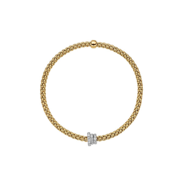 An 18ct yellow gold Flex'It bracelet with three pave diamond set rondels in white gold belonging to FOPE's Prima collection.