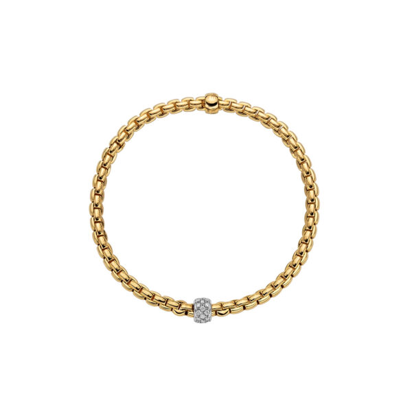 An 18ct yellow gold Flex'It bracelet with a white gold pave diamond set rondel belonging to FOPE's EKA Tiny collection.