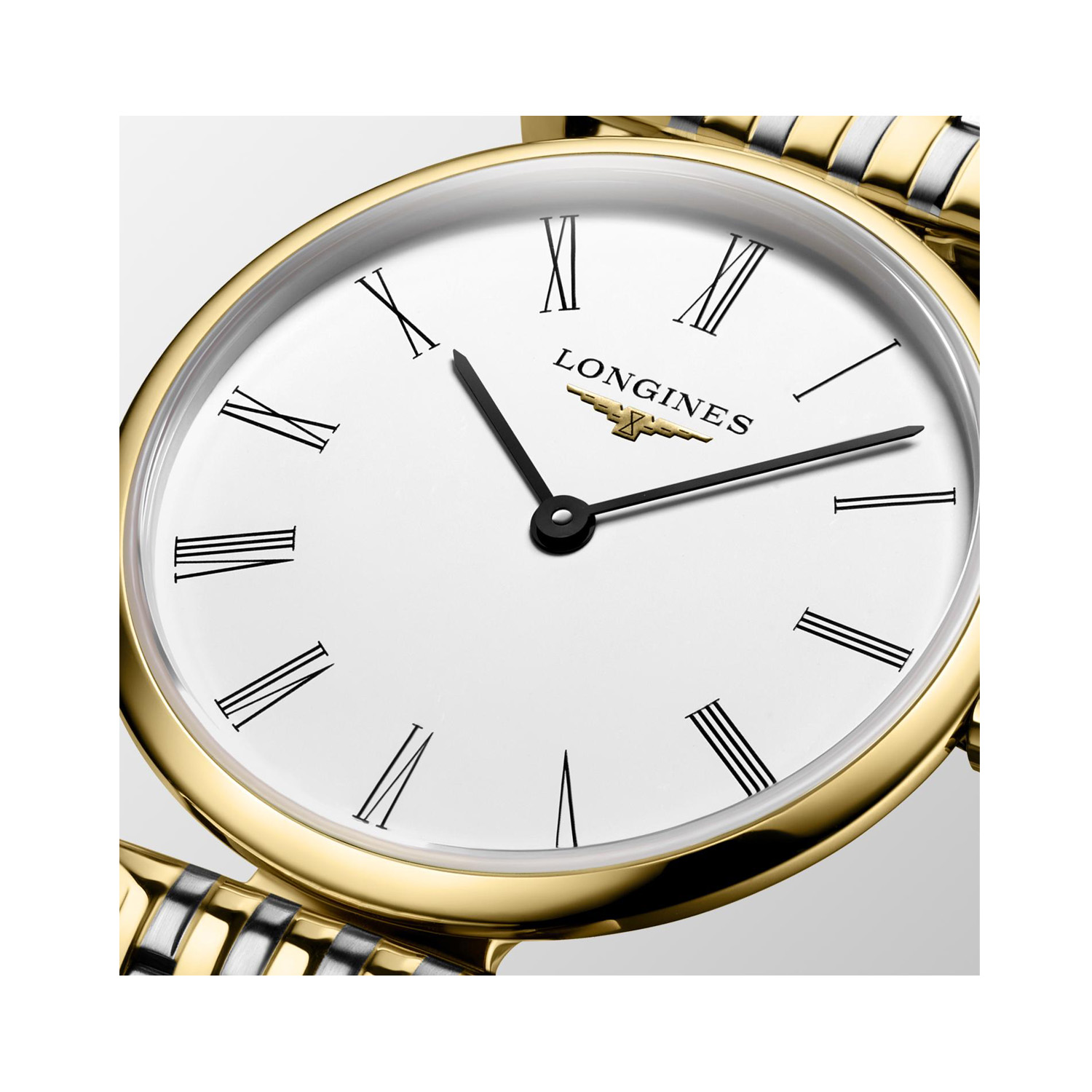 Longines, La Grande Classique with a 24mm stainless steel and yellow gold PVD coated case and bracelet strap feeaturing a white dial.