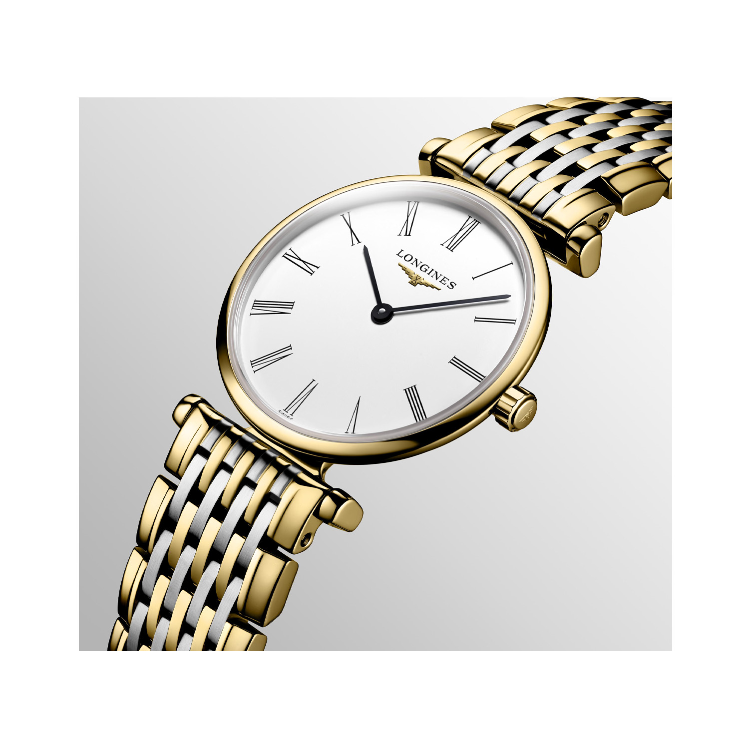 Longines, La Grande Classique with a 24mm stainless steel and yellow gold PVD coated case and bracelet strap feeaturing a white dial.