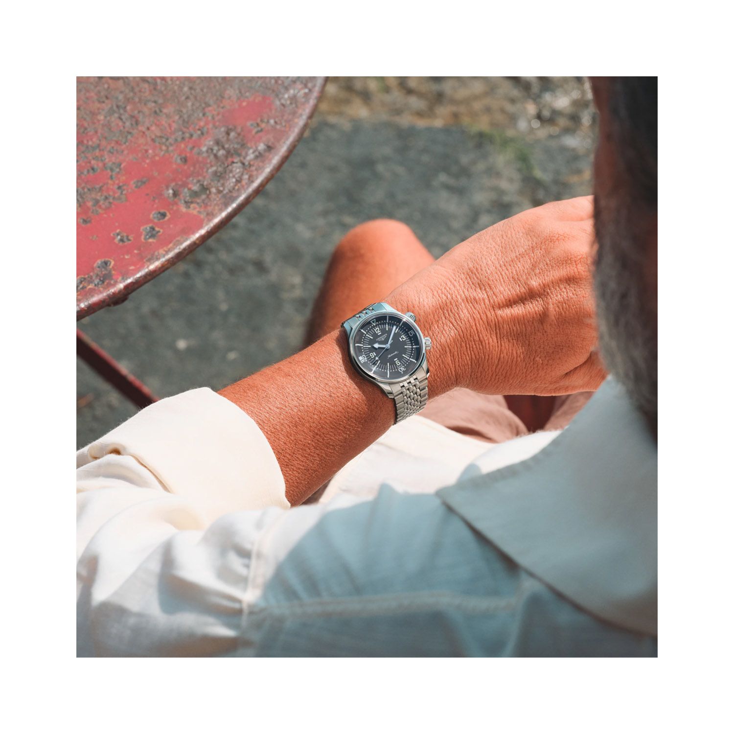 Longines, Legend Diver with a 39mm stainless steel case and bracelet strap featuring a grey dial.