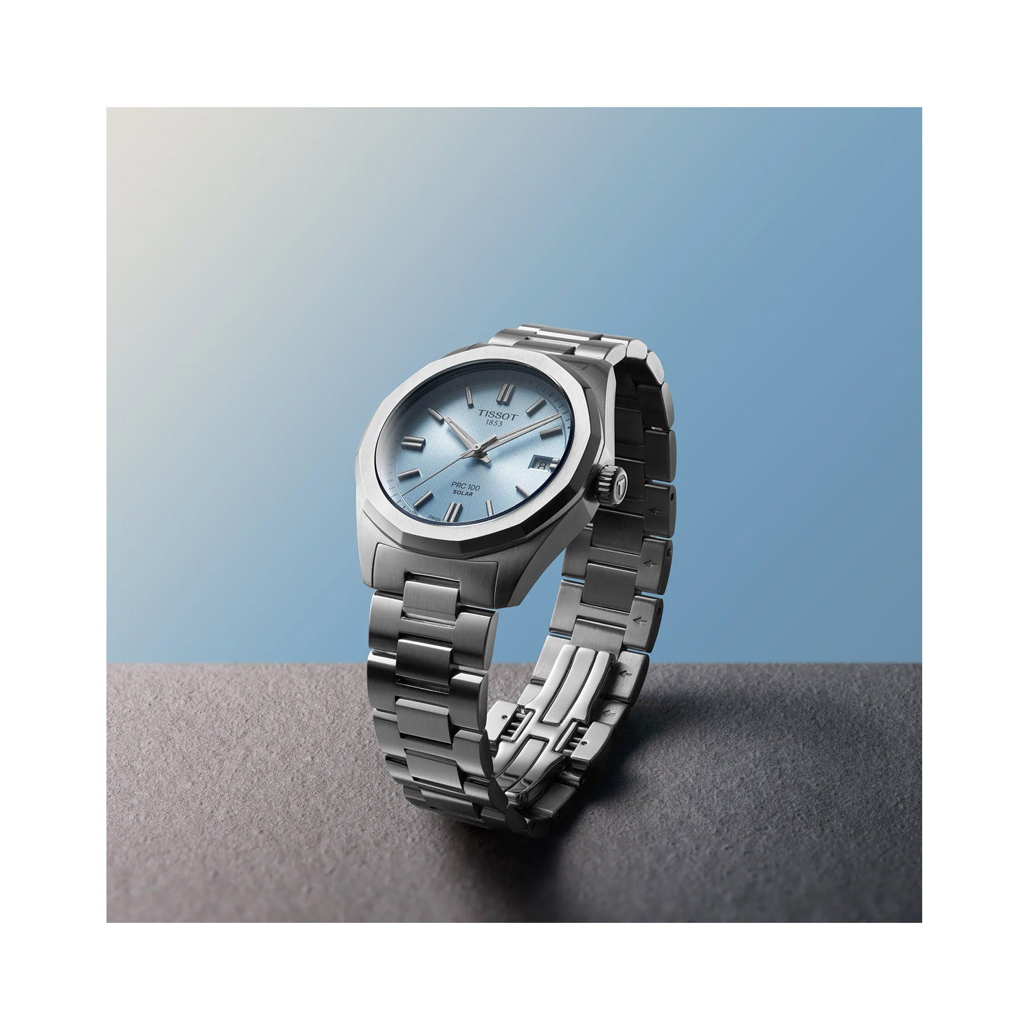 Tissot, PRC 100 Solar with a 34mm stainless steel case and bracelet strap featuring a date function and an ice blue coloured dial.