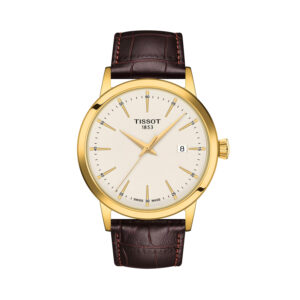 Tissot, Classic Dream with a 42mm stainless steel yellow gold PVD coated case and a brown leather strap featuring a date function and an ivory coloured dial.