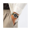 Hamilton, Khaki Field Power Reserve with a 40mm stainless steel case and a green textile strap featuring a black dial.