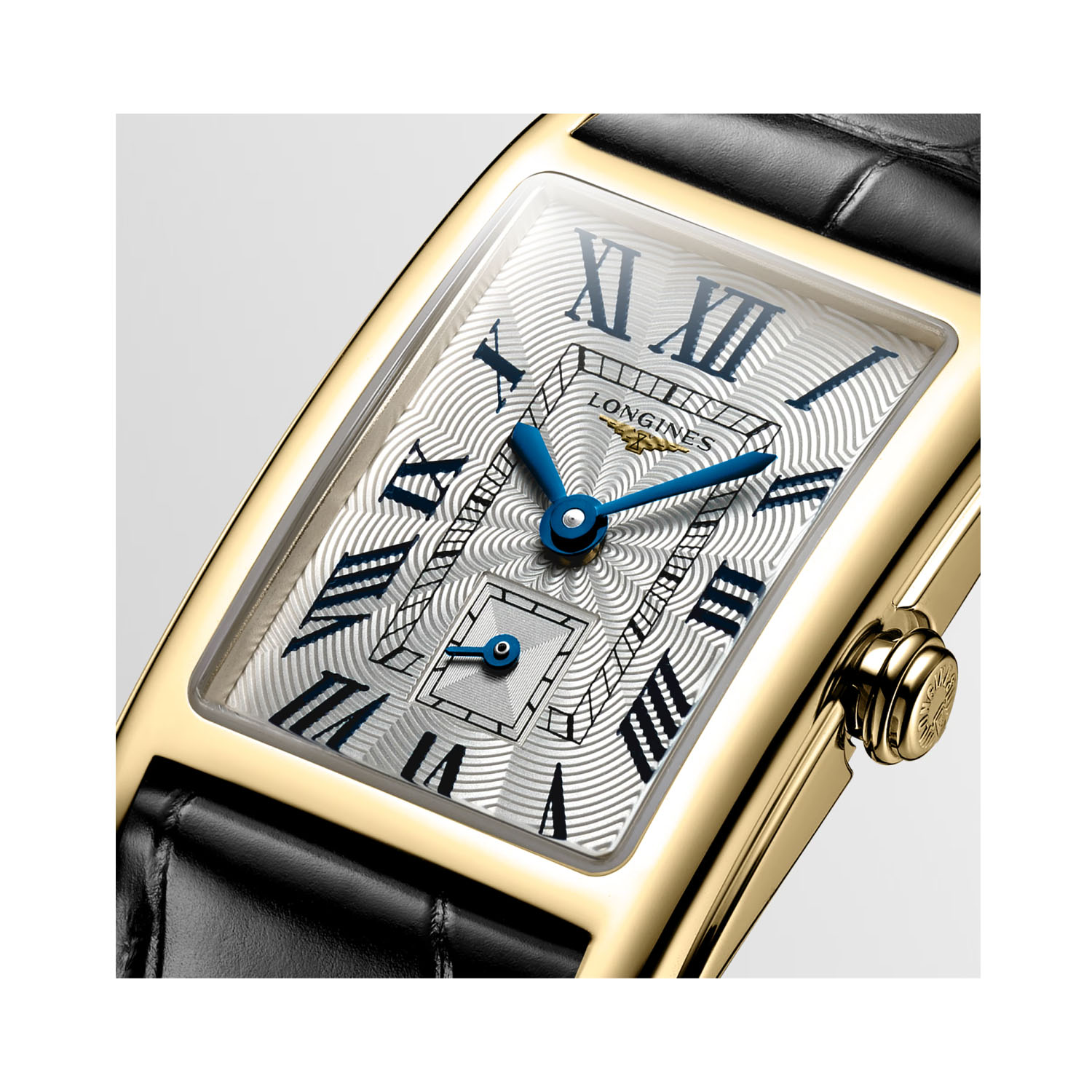 Longines, DolceVita 18ct Yellow Gold, Quartz Women's Watch Longines, DolceVita with a 20.5 x 32mm rectangular 18ct yellow gold case and a black leather strap featuring a small seconds hand and a silver "flinqué" dial.