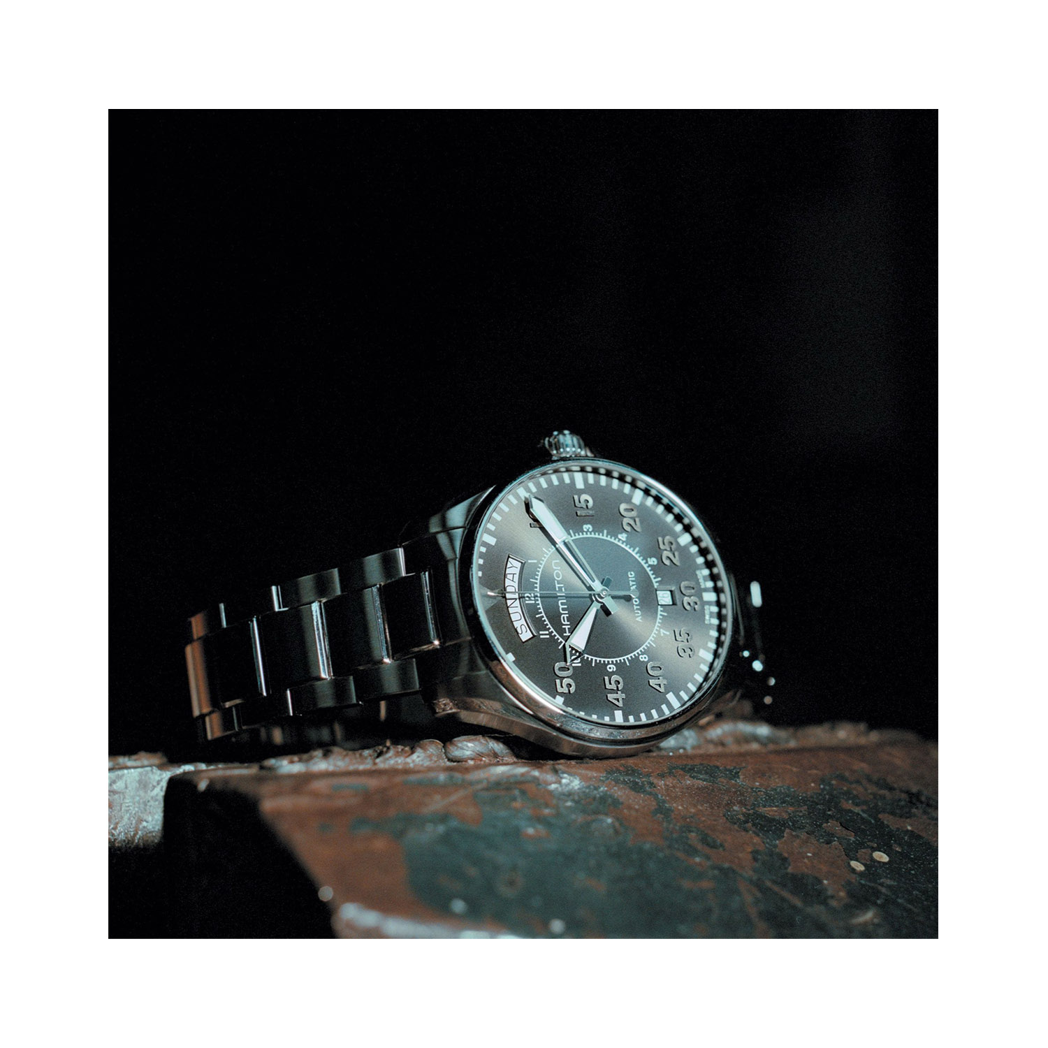 Hamilton, Khaki Aviation Pilot with a 42mm stainless steel case and bracelet strap featuring a day date function and a black dial.