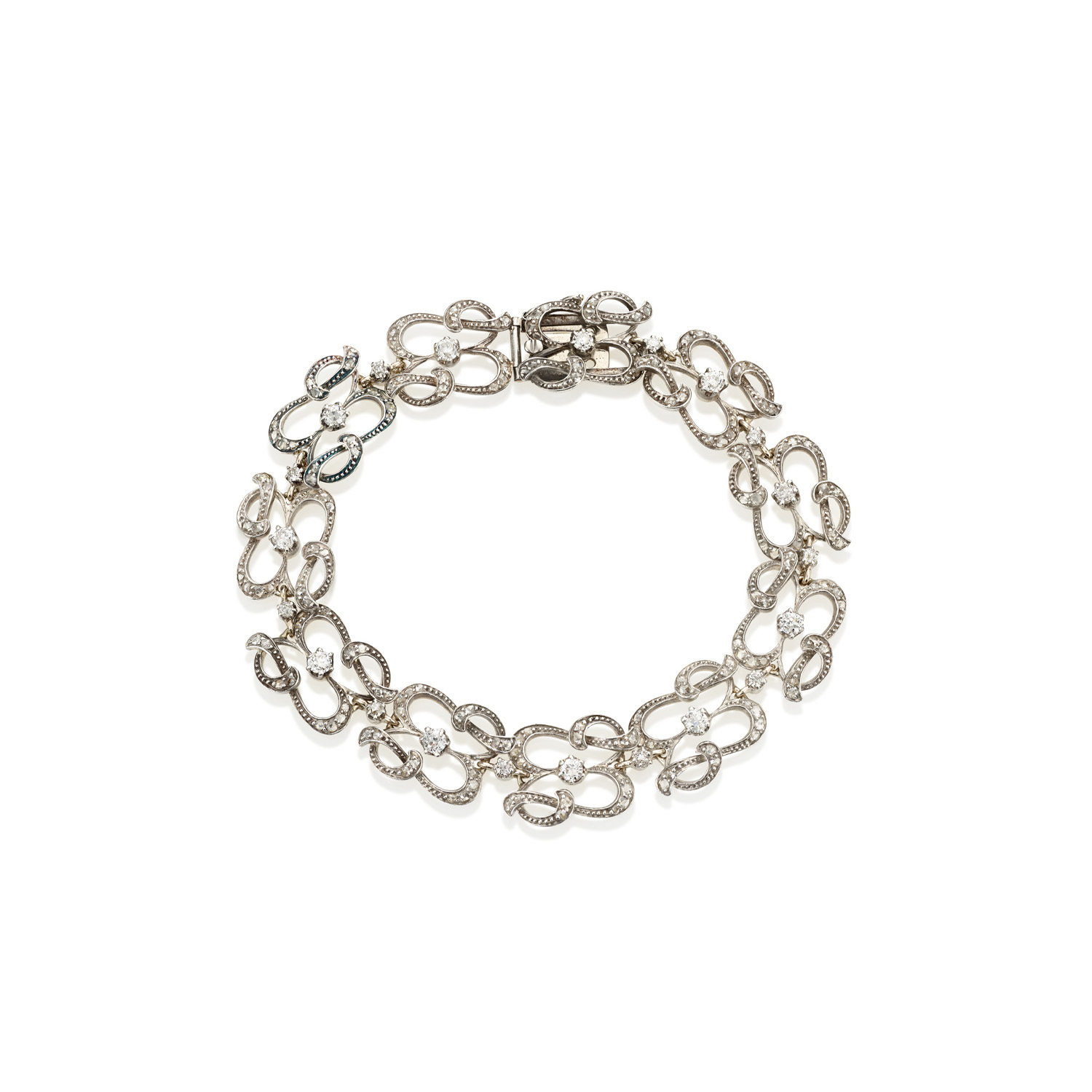 An antique yellow gold, brilliant and rose cut diamond bracelet with silver settings.