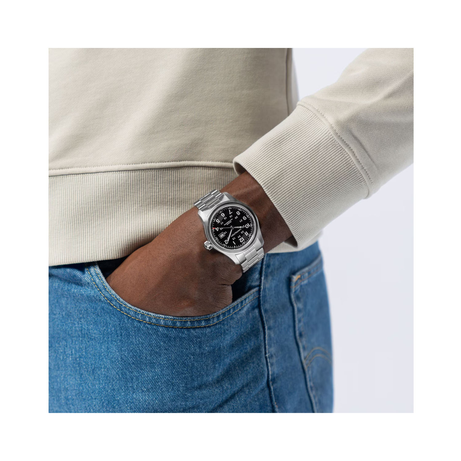 Hamilton, Khaki Field with a 42mm stainless steel case and bracelet strap featuring a date function and a black dial.