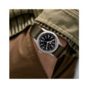 Hamilton, Khaki Field with a 38mm stainless steel case with a green NATO strap featuring a black dial.