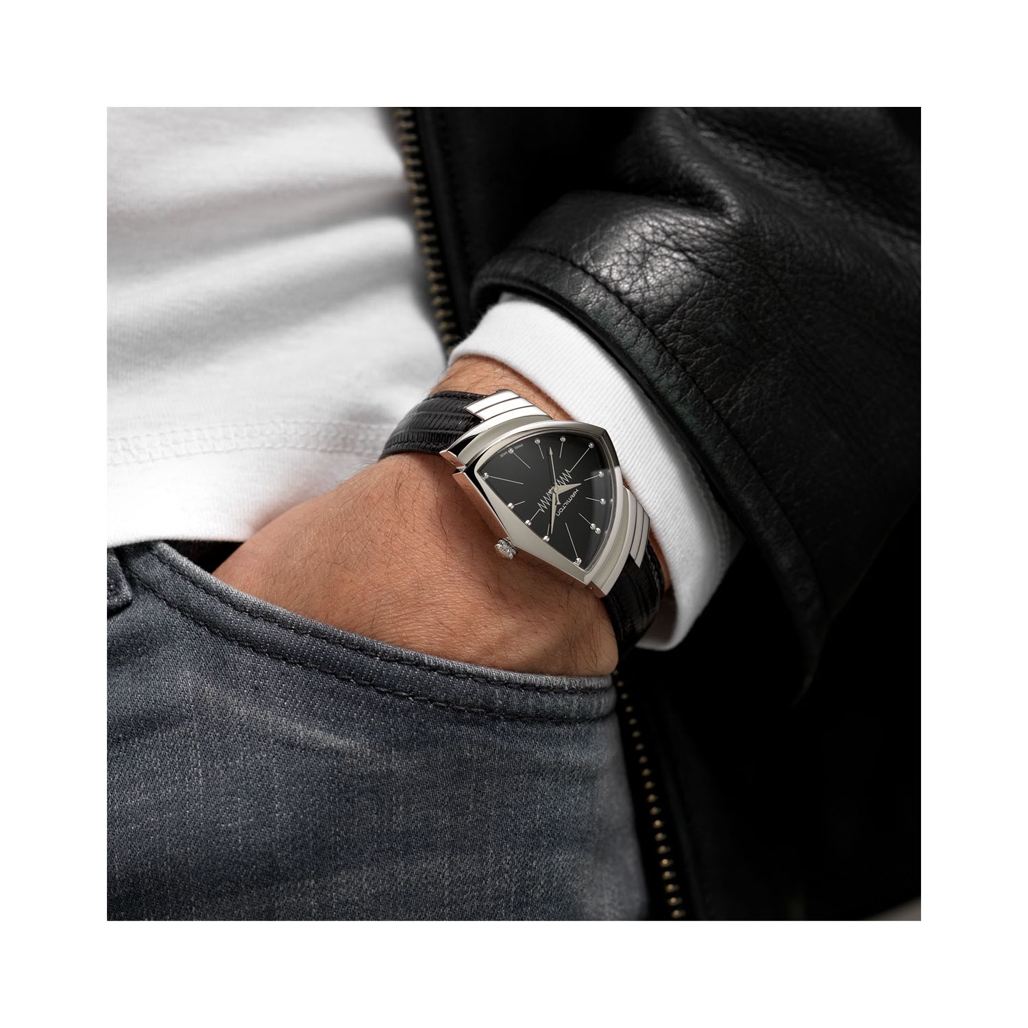 Hamilton, Ventura, Quartz Men's Watch Hamilton, Ventura with a 32.3mm and 50.3mm stainless steel triangular shaped case and a black leather strap featuring a black dial.