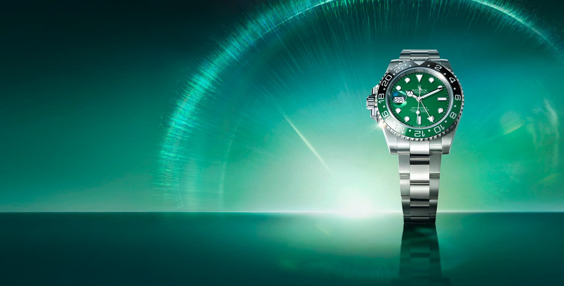 Rolex GMT II Master M126729VTNR-0001 on green background