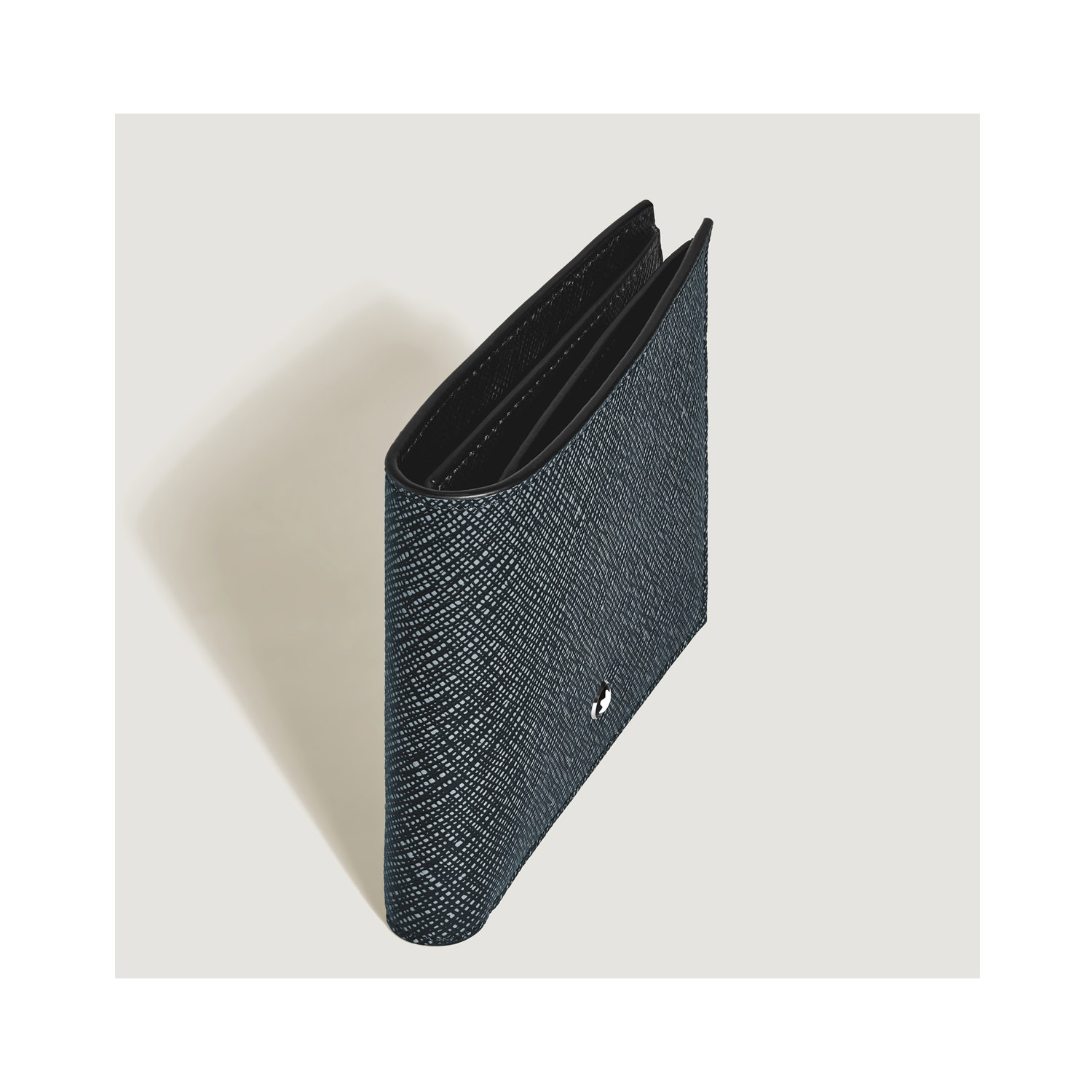 Montblanc, Sartorial Tweed Blue 6cc Wallet Montblanc, Sartorial wallet crafted in tweed blue leather with six dedicated spaces for cards, two compartments for banknotes and two additional smaller pockets.