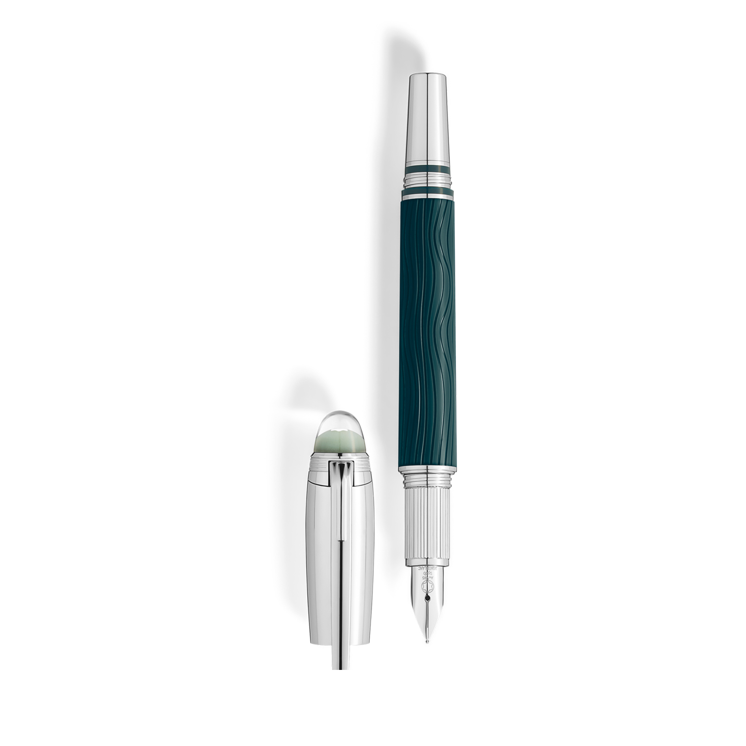 Montblanc, StarWalker PolarGreen Doué Fountain Pen Montblanc, StarWalker PolarGreen Doué Fountain Pen crafted in green precious resin with platinum-coated fittings, a hand-crafted Au 585 14ct gold, rhodium plated nib and a dome made from transparent resin with the Montblanc emblem that glows in low light.